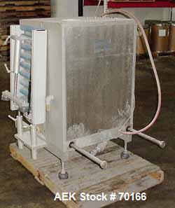 Used Multivac Vacuum Pouch Packaging Machine, Model AGV. 14" wide x 28" long, includes adjustable height infeed and discharge roller conveyor accepts pouch up to 15" tall. 24-1/2" seal jaw. Includes ...