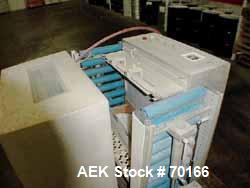 Used Multivac Vacuum Pouch Packaging Machine, Model AGV. 14" wide x 28" long, includes adjustable height infeed and discharge roller conveyor accepts pouch up to 15" tall. 24-1/2" seal jaw. Includes ...