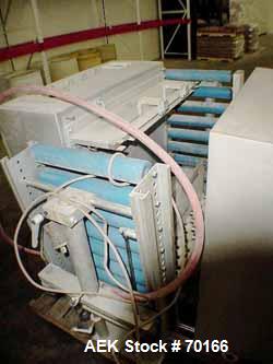 Used Multivac Vacuum Pouch Packaging Machine, Model AGV. 14" wide x 28" long, includes adjustable height infeed and discharge roller conveyor accepts pouch up to 15" tall. 24-1/2" seal jaw. Includes ...