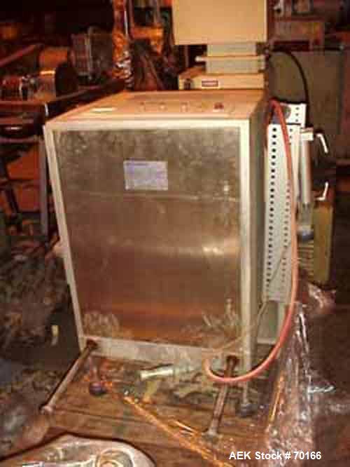 Used Multivac Vacuum Pouch Packaging Machine, Model AGV. 14" wide x 28" long, includes adjustable height infeed and discharge roller conveyor accepts pouch up to 15" tall. 24-1/2" seal jaw. Includes ...