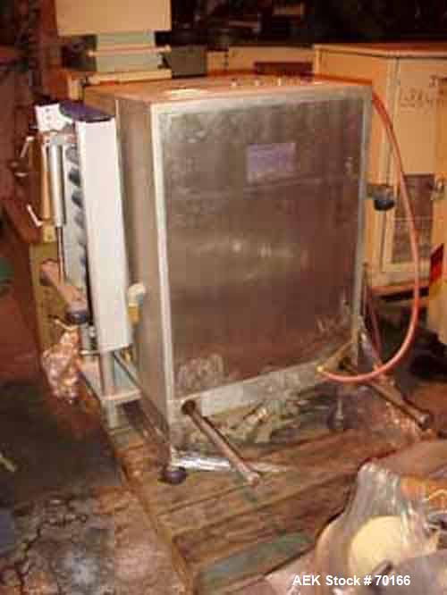 Used Multivac Vacuum Pouch Packaging Machine, Model AGV. 14" wide x 28" long, includes adjustable height infeed and discharge roller conveyor accepts pouch up to 15" tall. 24-1/2" seal jaw. Includes ...