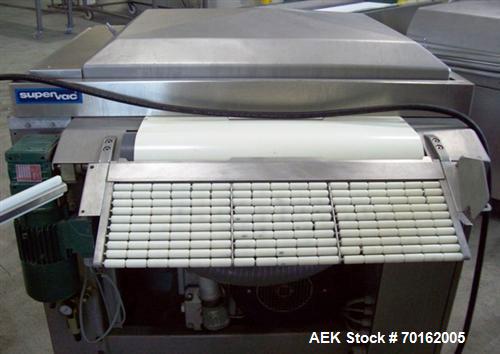 Used Supervac Automatic Vacuum Packaging Machine, Model GK 169B.  (2) 26.4" seal bars, 35" x 29" x 8" high chamber, 25.5" between seal bars, 160 cfm Busch vacuum pump, 220V/3 ph/60 hz.