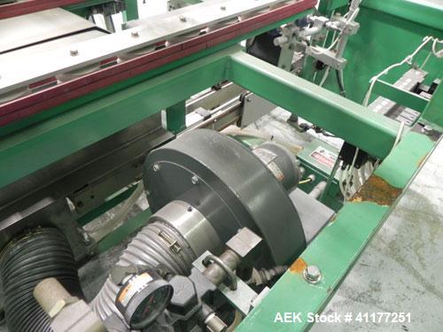 Used K&R Equipment Model PBI-AT 32 Case Erector and Bag Inserter. Capable of speeds up to 12 cases per minute. Has a case size range: 12" to 16" (length), 9" to 16" (width), 6" to 18" (depth). Maximu...