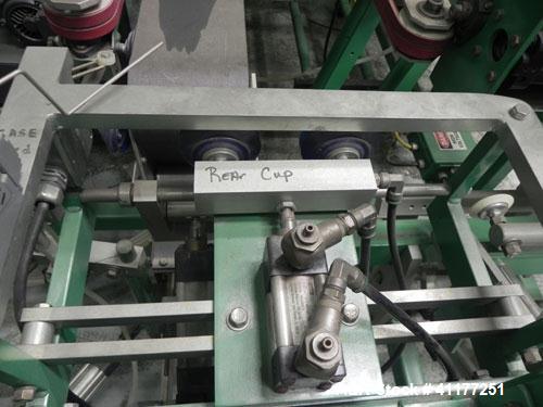 Used K&R Equipment Model PBI-AT 32 Case Erector and Bag Inserter. Capable of speeds up to 12 cases per minute. Has a case size range: 12" to 16" (length), 9" to 16" (width), 6" to 18" (depth). Maximu...