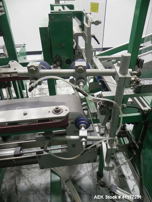 Used K&R Equipment Model PBI-AT 32 Case Erector and Bag Inserter. Capable of speeds up to 12 cases per minute. Has a case size range: 12" to 16" (length), 9" to 16" (width), 6" to 18" (depth). Maximu...