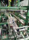 Used K&R Equipment Model PBI-AT 32 Case Erector and Bag Inserter. Capable of speeds up to 12 cases per minute. Has a case size range: 12