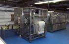 Used OK International SL220 Bag In Box Line capable of speeds up to 18 cases per minute.Line consists of an OK International Superform 2 case erector, Superliner SL220 bag maker/inserter,and an OK In...