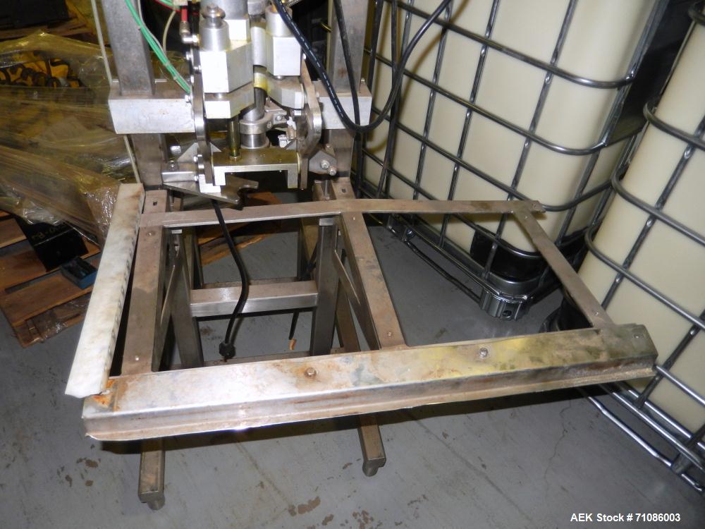 Used Liqui-Box Corp Model 1000-CIT-W Bag-In-Box Liquid Filler. Is capable of speeds from 3-6 per minute at fills from 1 to 5 gallons. Is a single-head filler, best used for oxygen-sensitive products....