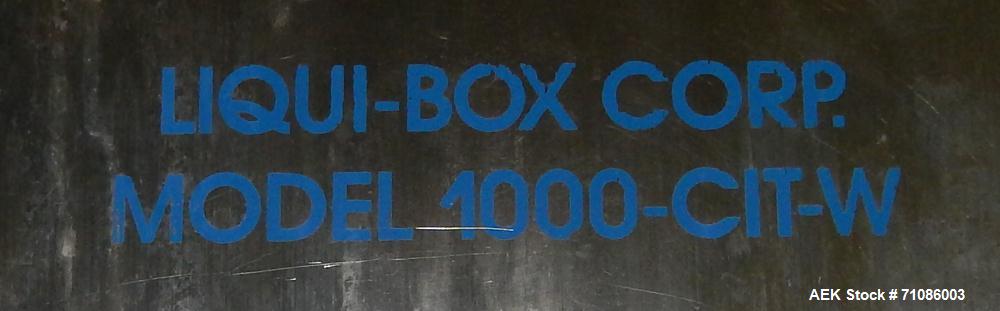 Used Liqui-Box Corp Model 1000-CIT-W Bag-In-Box Liquid Filler. Is capable of speeds from 3-6 per minute at fills from 1 to 5 gallons. Is a single-head filler, best used for oxygen-sensitive products....