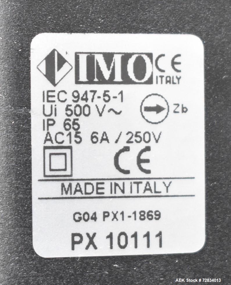 IPN usado (Scholle) Llenadora de bolsa en caja con aplicador más cerca. Diseño de tablero. Serie # 04.G1.069.
