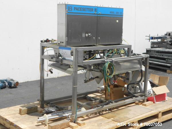 Used LiquiBox (DuPont) BIB Filler. Strip fed bag filler with OxEvac system is designed to fill one to five gallon bags used in the wine, juice, beverage and other oxygen sensitive products. A carton ...