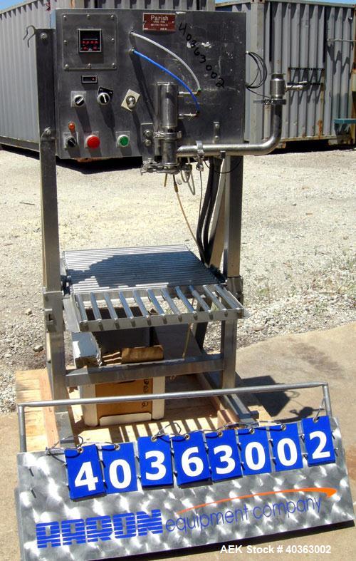 Used Parish Case-Pak meter filler, model M125, 304 stainless steel. Capacity one gallon to six gallon bags. Designed to automatically fill predetermined volumes of liquid products into polyethylene b...