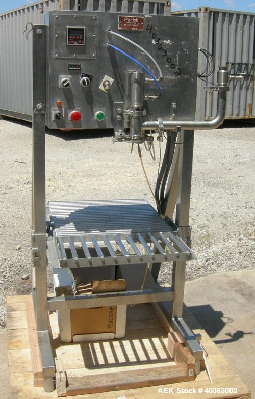 Used Parish Case-Pak meter filler, model M125, 304 stainless steel. Capacity one gallon to six gallon bags. Designed to automatically fill predetermined volumes of liquid products into polyethylene b...