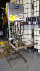 Used Liqui-Box Corp Model 1000-CIT-W Bag-In-Box Liquid Filler. Is capable of speeds from 3-6 per minute at fills from 1 to 5 gallons. Is a single-head filler, best used for oxygen-sensitive products....