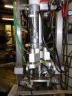 Used Liqui-Box Corp Model 1000-CIT-W Bag-In-Box Liquid Filler. Is capable of speeds from 3-6 per minute at fills from 1 to 5 gallons. Is a single-head filler, best used for oxygen-sensitive products....