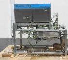 Used LiquiBox (DuPont) BIB Filler. Strip fed bag filler with OxEvac system is designed to fill one to five gallon bags used in the wine, juice, beverage and other oxygen sensitive products. A carton ...