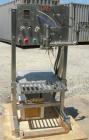 Used Parish Case-Pak meter filler, model M125, 304 stainless steel. Capacity one gallon to six gallon bags. Designed to automatically fill predetermined volumes of liquid products into polyethylene b...