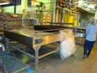 Used Seco stainless steel manual debagging table with 90