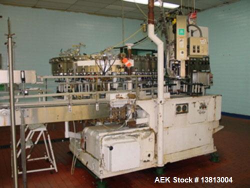 Used Crown 45 Valve Filler, Model 45-6. With 6 head cap-in-head capper. 3.0L pitch machine. Includes Alcoa 6 head capper converted to cap-in-head for 28 mm flat caps. Includes cap sorter. Change part...