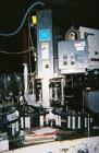 Used Crown 45 Valve Filler, Model 45-6. With 6 head cap-in-head capper. 3.0L pitch machine. Includes Alcoa 6 head capper converted to cap-in-head for 28 mm flat caps. Includes cap sorter. Change part...