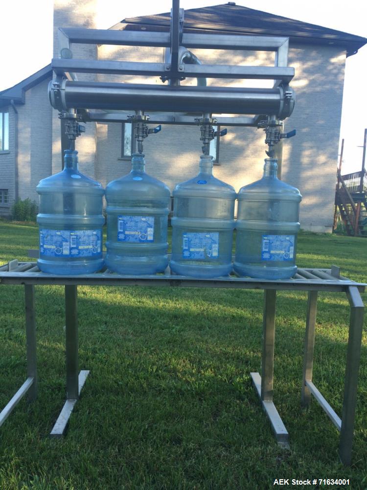 Used Water Bottling Plant, 18.9L, 11L, and 4L Bottles. Plant consists of: 1 x 4 bottle filler with conveyor. (1) bottle water cooler type washer with ozonator. (1) Ozonator, (1) oxygen generator and ...