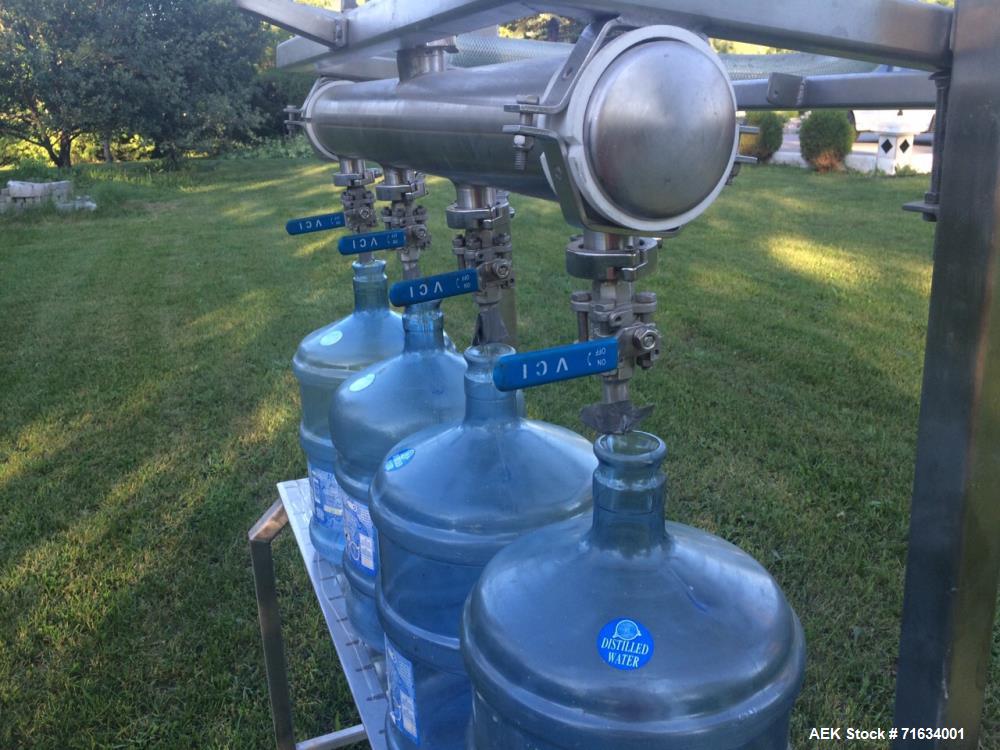 Used Water Bottling Plant, 18.9L, 11L, and 4L Bottles. Plant consists of: 1 x 4 bottle filler with conveyor. (1) bottle water cooler type washer with ozonator. (1) Ozonator, (1) oxygen generator and ...