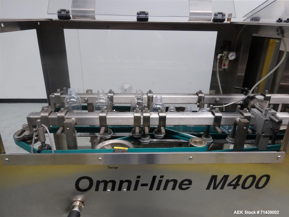 Used Sympac Model 16/16/4 Tribloc 16.9 oz Bottle Water Filling Line