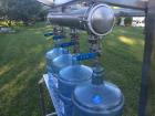 Used Water Bottling Plant, 18.9L, 11L, and 4L Bottles. Plant consists of: 1 x 4 bottle filler with conveyor. (1) bottle water cooler type washer with ozonator. (1) Ozonator, (1) oxygen generator and ...