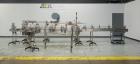 Used Sympac Model 16/16/4 Tribloc 16.9 oz Bottle Water Filling Line