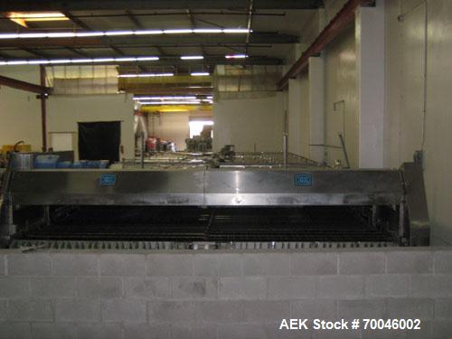 Used I&H Pasteurizer/Cooler, Approximately 14' x 60', Stainless Steel. Cooling tunnel with plastic Intralox-style belt. Discharge end drive. Modular construction consisting of (7) 8’ long sections. I...