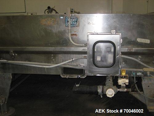 Used I&H Pasteurizer/Cooler, Approximately 14' x 60', Stainless Steel. Cooling tunnel with plastic Intralox-style belt. Discharge end drive. Modular construction consisting of (7) 8’ long sections. I...
