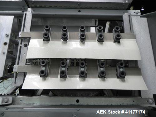 Used Alloyd Model 16SC1216 Blister Sealer. Capable of speeds from 6 to 20 cycles per minute. Has 16 stations with 12" (wide) X 16" (long) seal area. Machine has (8) load stations. Seal temperature ra...