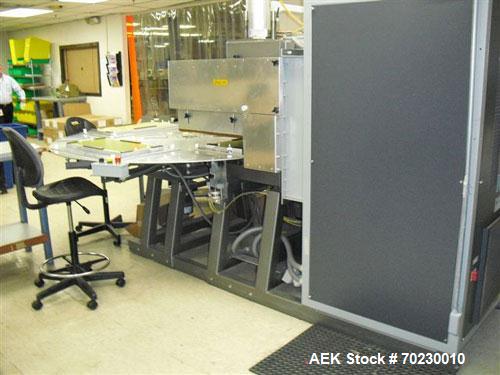 Used Alloyd Model 200SB Rotary Blister Sealer. 4 station, 84" diameter table, 26" x 32" seal stations, 3 product loading/unloading stations, 20 kw RF energy, 208-230 volt, serial# M2005-019.
