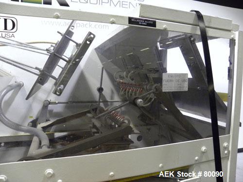 Used Alloyd Brands Four Station Rotary Blister Sealer, Model 4SM1216sn 93-824. Capable of speeds 10 to 20 indexes per minute, indexes per minute multiplied by the number of packages per nesting tray....