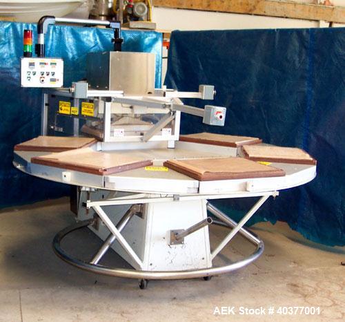 Used Visual Packaging Thermoforming Six Station Rotary Blister Sealer, model ESDS-6. Approximately 78” diameter turntable, 18" x 22" ( 45.7 cm x 56 cm ) seal area. Seal pressure 5000 lbs @ 100 psi (2...