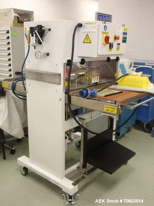 Used Alloyd Model 2S1628LU1 Two Station Shuttle Blister Sealer. Has a seal area of 16" x 28". Seal temperature range: up to 800 deg F. Seal dwell range: 1 - 15 second cycles. Has an Analog dwell time...