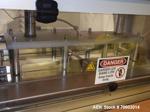 Used Alloyd Model 2S1628LU1 Two Station Shuttle Blister Sealer. Has a seal area of 16" x 28". Seal temperature range: up to 800 deg F. Seal dwell range: 1 - 15 second cycles. Has an Analog dwell time...