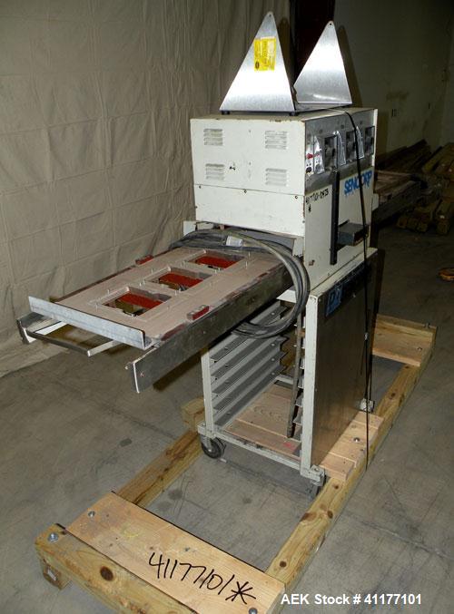 Used Sencorp F-20 Blister Sealer. Two station shuttle blister sealer has a 13" x 21" seal area. Maximum blister depth: 4.5". Cylinder size: 3.5".  Air requremets: 65 to 100 psi. Mounted on stand.