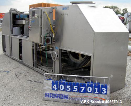 Used Bevco Low Level Bottle Gripper Air Rinser/ Inverter, Model 600, 304 stainless steel. Approximately 400 bottles per minute. Unit is on 12' centers from centerline of wheel to centerline, maximum ...