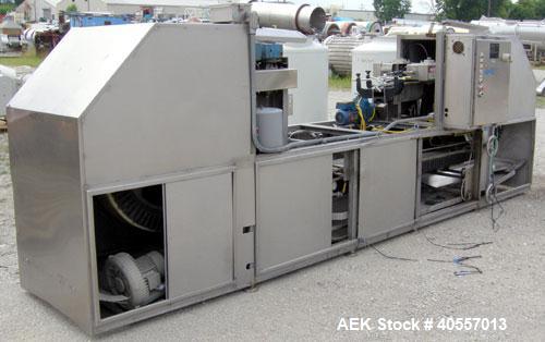 Used Bevco Low Level Bottle Gripper Air Rinser/ Inverter, Model 600, 304 stainless steel. Approximately 400 bottles per minute. Unit is on 12' centers from centerline of wheel to centerline, maximum ...