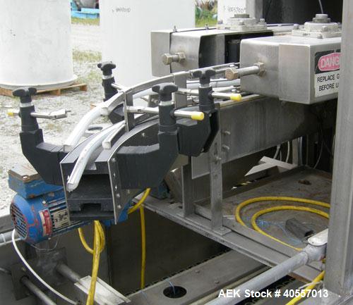 Used Bevco Low Level Bottle Gripper Air Rinser/ Inverter, Model 600, 304 stainless steel. Approximately 400 bottles per minute. Unit is on 12' centers from centerline of wheel to centerline, maximum ...