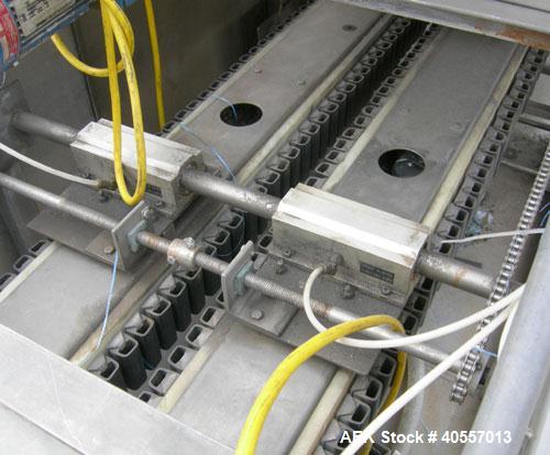 Used Bevco Low Level Bottle Gripper Air Rinser/ Inverter, Model 600, 304 stainless steel. Approximately 400 bottles per minute. Unit is on 12' centers from centerline of wheel to centerline, maximum ...