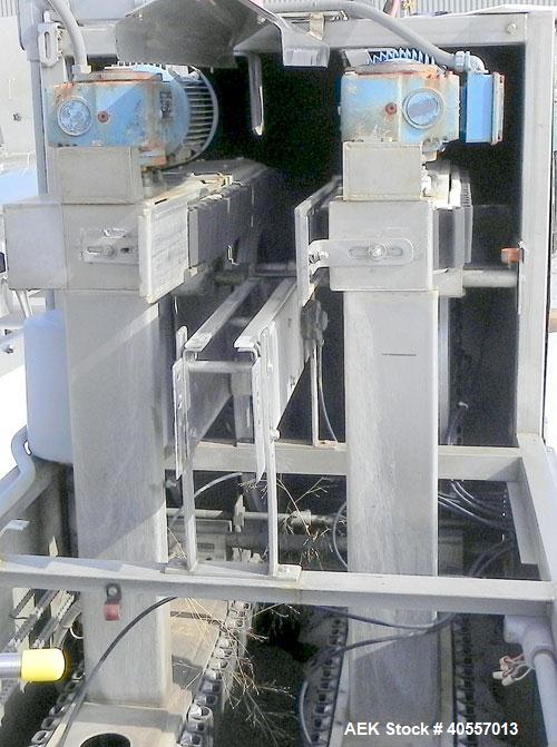 Used Bevco Low Level Bottle Gripper Air Rinser/ Inverter, Model 600, 304 stainless steel. Approximately 400 bottles per minute. Unit is on 12' centers from centerline of wheel to centerline, maximum ...