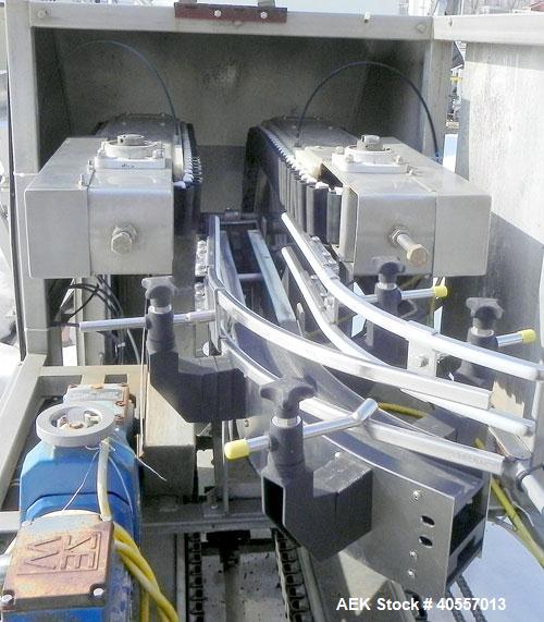 Used Bevco Low Level Bottle Gripper Air Rinser/ Inverter, Model 600, 304 stainless steel. Approximately 400 bottles per minute. Unit is on 12' centers from centerline of wheel to centerline, maximum ...