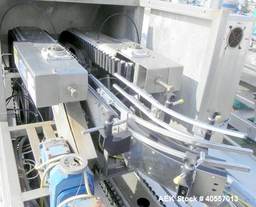Used Bevco Low Level Bottle Gripper Air Rinser/ Inverter, Model 600, 304 stainless steel. Approximately 400 bottles per minute. Unit is on 12' centers from centerline of wheel to centerline, maximum ...