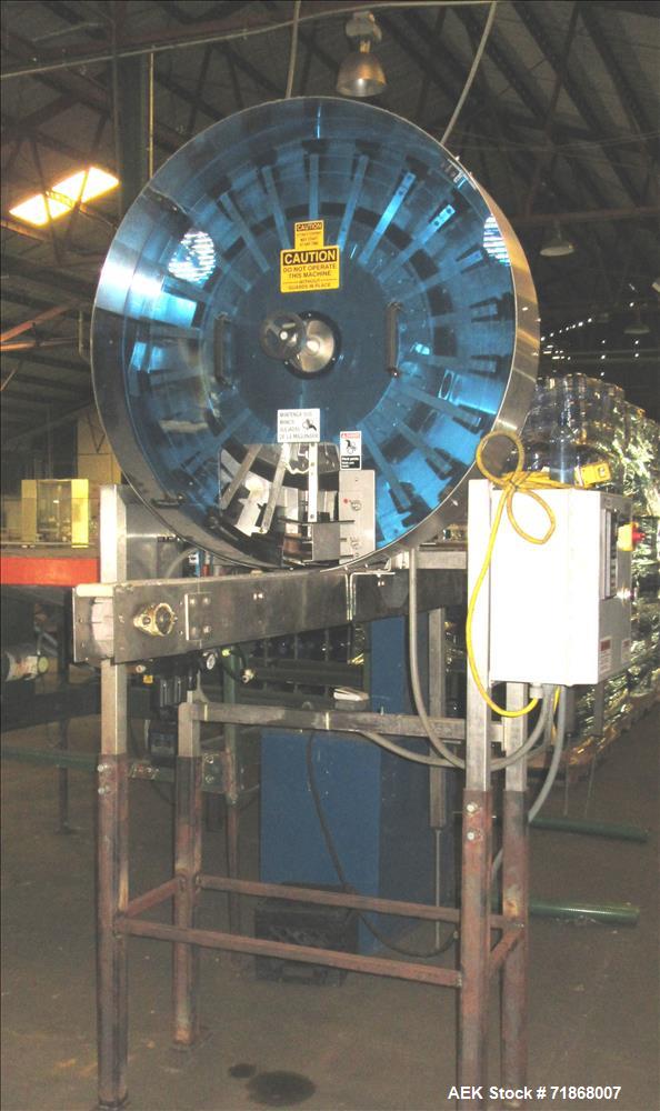 Used McBrady Orbital Bottle Air Cleaner / Rinser, mn 200, sn A48-21238 with control panel, capable of 200 bottles per minute max speed, 4 1/2" table top plastic feed conveyor approx 20' long L-shape ...