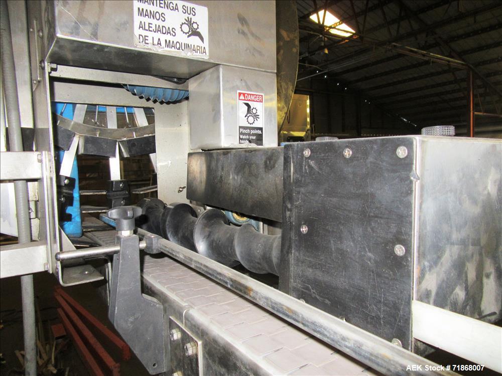 Used McBrady Orbital Bottle Air Cleaner / Rinser, mn 200, sn A48-21238 with control panel, capable of 200 bottles per minute max speed, 4 1/2" table top plastic feed conveyor approx 20' long L-shape ...