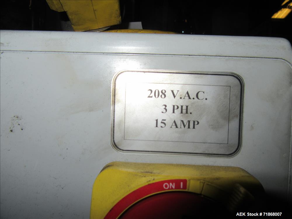 Used McBrady Orbital Bottle Air Cleaner / Rinser, mn 200, sn A48-21238 with control panel, capable of 200 bottles per minute max speed, 4 1/2" table top plastic feed conveyor approx 20' long L-shape ...