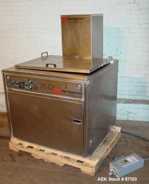 USED: Sonic Systems top load ultrasonic bottle cleaner, model 703R, stainless steel. Chamber 3' wide x 29" long x 15" deep. Hinged top cover. 1/60/120/240. Hot and cold water inelts, temp control, ti...
