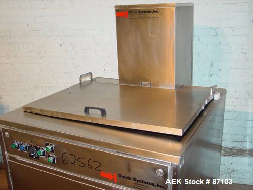 USED: Sonic Systems top load ultrasonic bottle cleaner, model 703R, stainless steel. Chamber 3' wide x 29" long x 15" deep. Hinged top cover. 1/60/120/240. Hot and cold water inelts, temp control, ti...